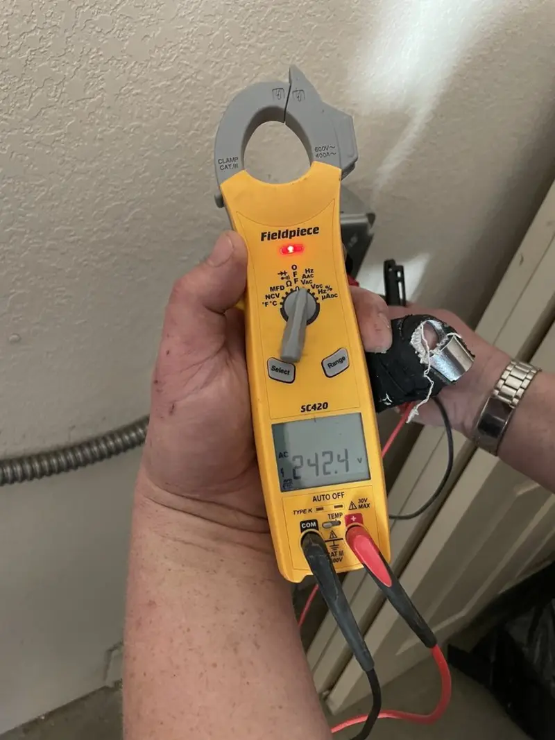 Voltage testing with clamp meter during Generator Installation in Farmington
